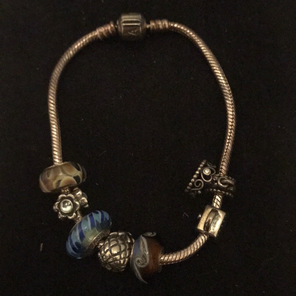 Authentic Pandora 925 charm bracelet with 7 charms
